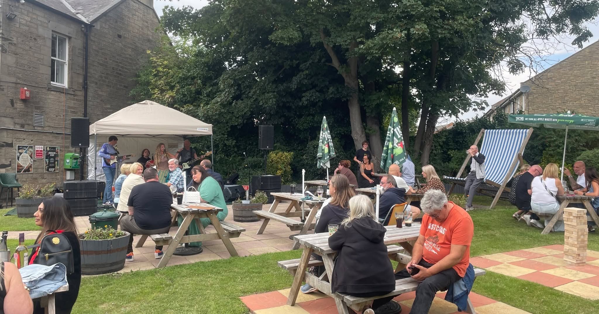 Live music playing to guests in the pub garden at MilliFest